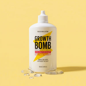 Scalp detox exfoliant bottle, white with Growth Bomb label and flat base