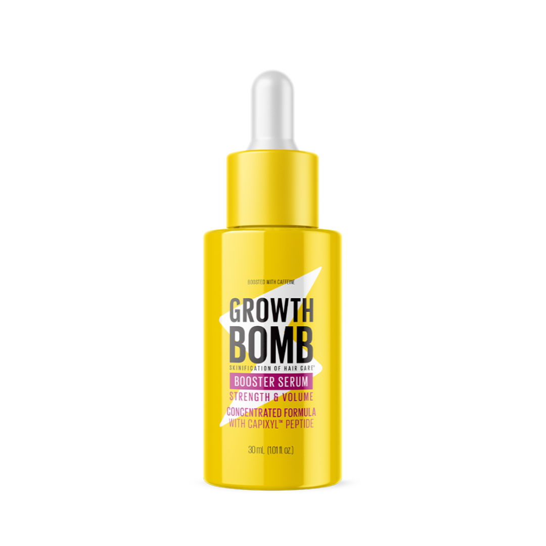 A yellow dropper bottle labeled Booster Serum Strength & Length for hair care enhances Strength & Volume, featuring Capixyl™ peptide and botanical extracts. Contains 30ml (1.01 fl oz). Black background.