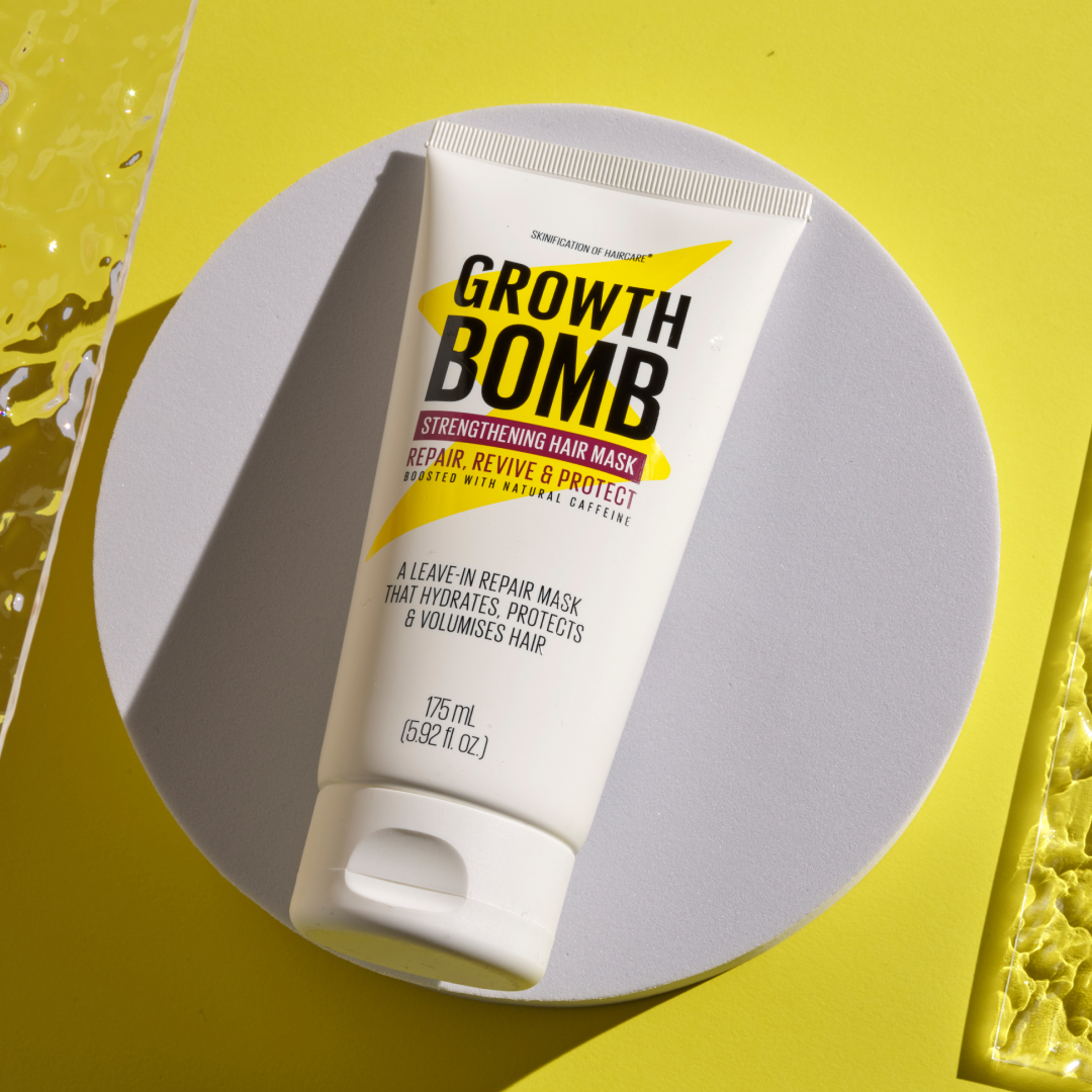 A 175 ML tube of the 10 Minute Miracle Mask rests on a circular white surface against a yellow background, featuring benefits like repair, revive, and protect. It deeply hydrates, protects, volumizes, and strengthens hair.