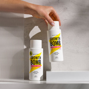Daily wash duo shampoo and conditioner bottles, white plastic with yellow label