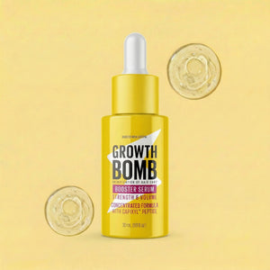 Yellow hair growth serum bottle with dropper, shown with gel swirls