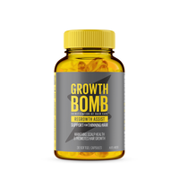 A bottle of Growth Bomb USs Regrowth Assist Support for Thinning Hair Supplement with a yellow label promotes hair growth and scalp health. Maintain thick hair with 30 nourishing softgel capsules designed to support thinning hair.