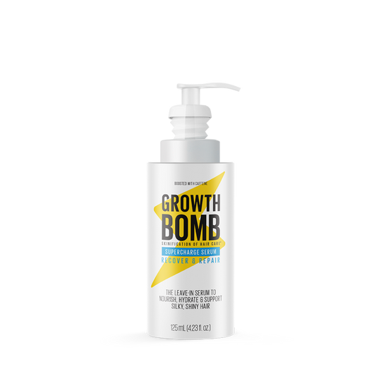 The Supercharge Serum by Growth Bomb is a 125ml leave-in hair care product with a white pump dispenser, featuring bold GROWTH BOMB and Recover & Repair text. It tames frizz while moisturizing and protecting hair.