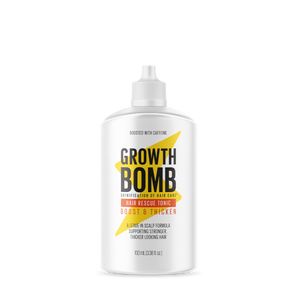 The image shows a white bottle of the Hair Rescue Tonic from Growth Bomb, featuring bold black and yellow text on its label. The tonic has a caffeine-boosted formula for improved scalp condition and stronger hair, with the bottle containing 100 mL (3.38 fl oz).